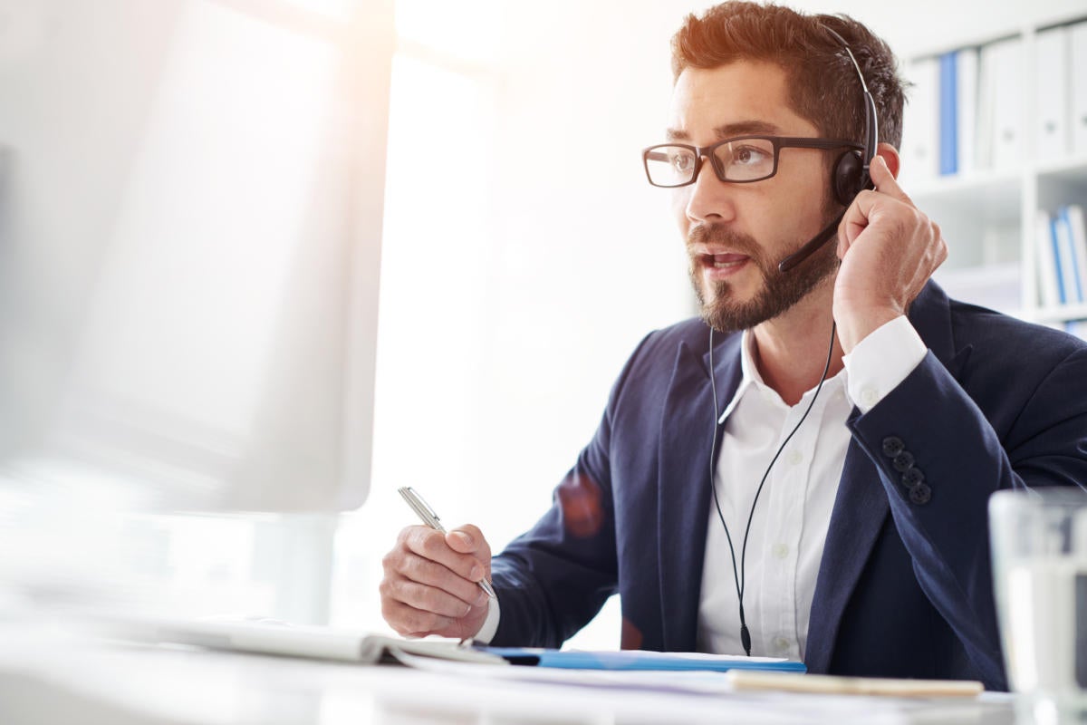 man computer headset speech recognition